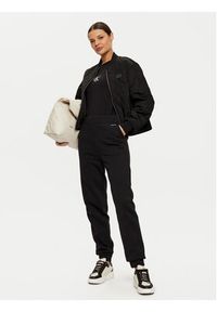 Calvin Klein Spodnie dresowe K20K208330 Czarny Relaxed Fit. Kolor: czarny. Materiał: bawełna #3