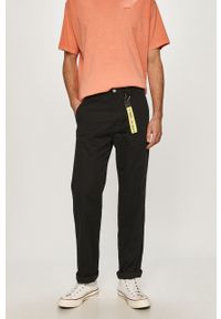 Tommy Jeans Spodnie męskie kolor czarny. Okazja: na co dzień. Kolor: czarny. Materiał: bawełna, tkanina. Wzór: gładki. Styl: casual