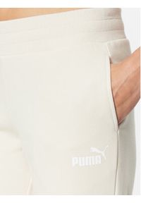 Puma Spodnie dresowe Ess 586841 Biały Regular Fit. Kolor: biały. Materiał: syntetyk, dresówka, bawełna
