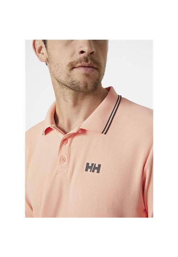 Koszulka sportowa męska Helly Hansen 34068058. Typ kołnierza: polo. Kolor: różowy. Styl: sportowy