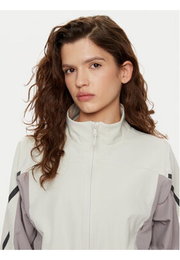 Under Armour Wiatrówka UA Unstoppable Crop 1386479 Écru Regular Fit. Materiał: syntetyk