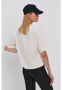 Reebok Classic T-shirt damski kolor kremowy. Kolor: beżowy. Materiał: dzianina, bawełna. Wzór: gładki