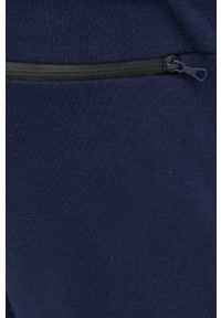 Lacoste Spodnie XH0011R męskie kolor granatowy gładkie. Kolor: niebieski. Materiał: dzianina. Wzór: gładki #3