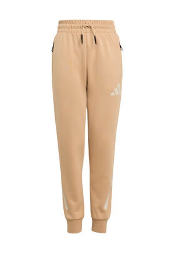 Adidas - adidas Spodnie dresowe Z.N.E. JW4002 Beżowy Tapered Leg. Kolor: beżowy. Materiał: bawełna