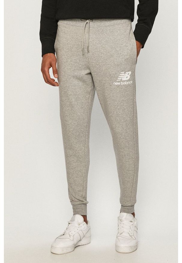 New Balance Spodnie MP03558AG męskie kolor szary. Kolor: szary