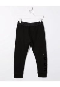 DSQUARED2 KIDS - Czarne spodnie dresowe z logo 4-16 lat. Kolor: czarny. Materiał: dresówka. Długość: długie. Wzór: nadruk. Sezon: lato #2