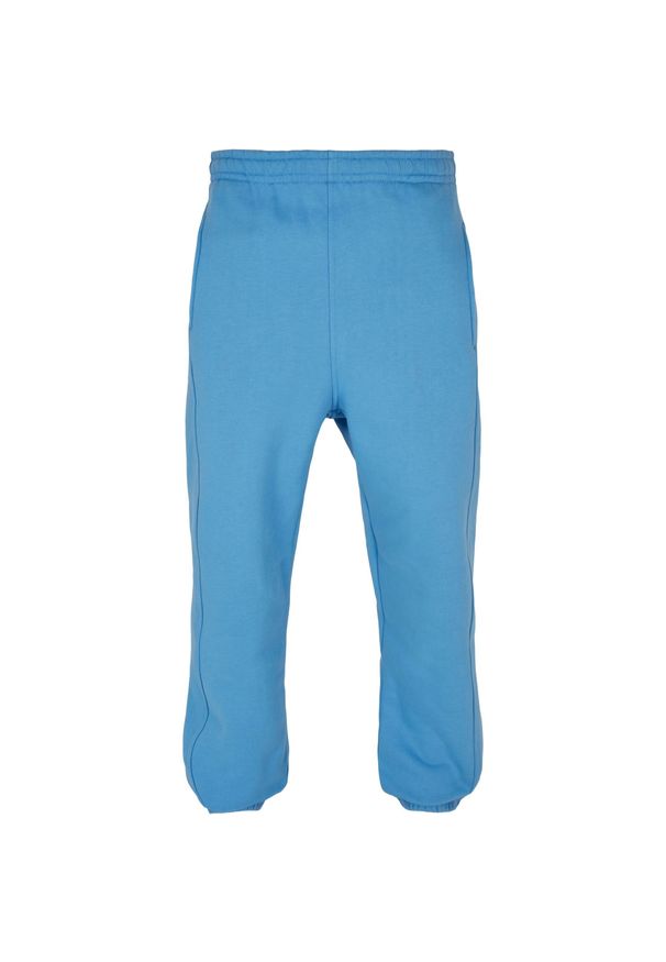 Spodnie do biegania Urban Classics. Kolor: niebieski. Długość: długie. Sport: bieganie