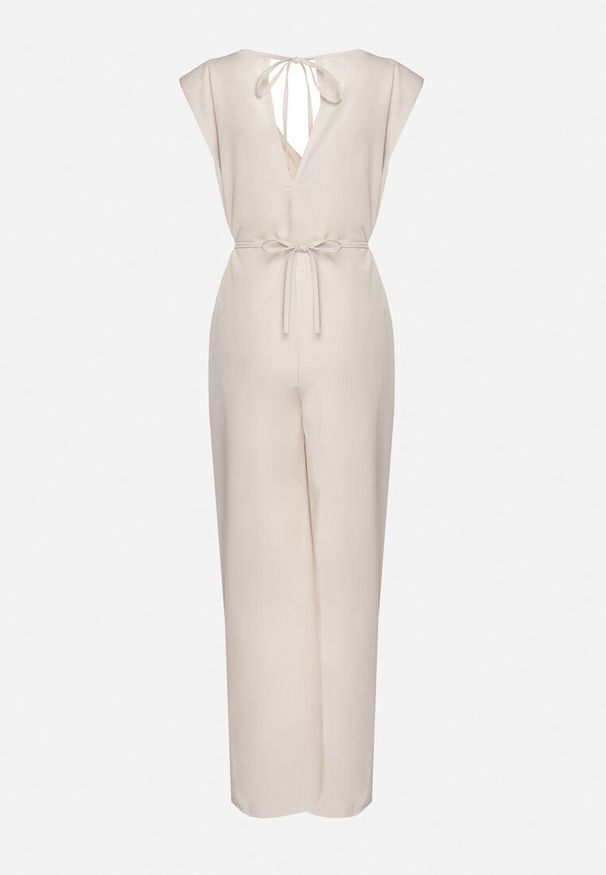 Born2be - Beżowy Wiązany Kombinezon z Prostymi Nogawkami i Wiskozą oraz Kwiatową Aplikacją Dimenna. Kolor: beżowy. Materiał: wiskoza. Wzór: kwiaty, aplikacja. Styl: elegancki