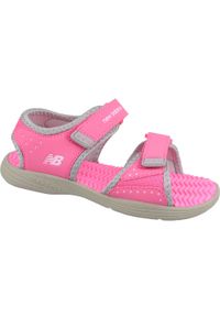 Buty do chodzenia dla dzieci New Balance Kids Poolside Sandal. Zapięcie: rzepy. Kolor: różowy. Materiał: materiał, syntetyk. Szerokość cholewki: normalna. Sport: turystyka piesza #1