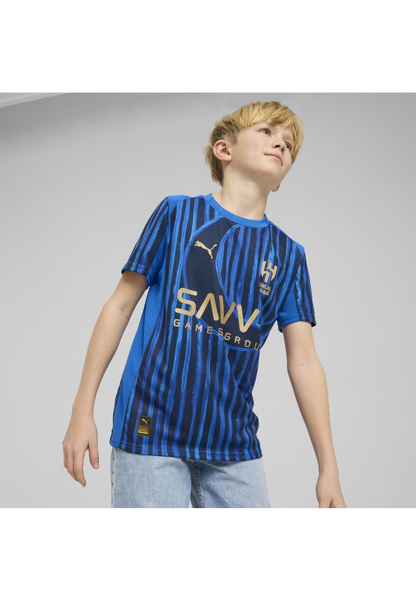 Puma - Młodzieżowa koszulka KIDSUPER × AL-HILAL SFC PUMA. Kolor: niebieski. Sport: piłka nożna