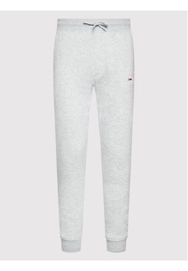 Tommy Jeans Spodnie dresowe DM0DM15380 Szary Slim Fit. Kolor: szary. Materiał: bawełna, syntetyk