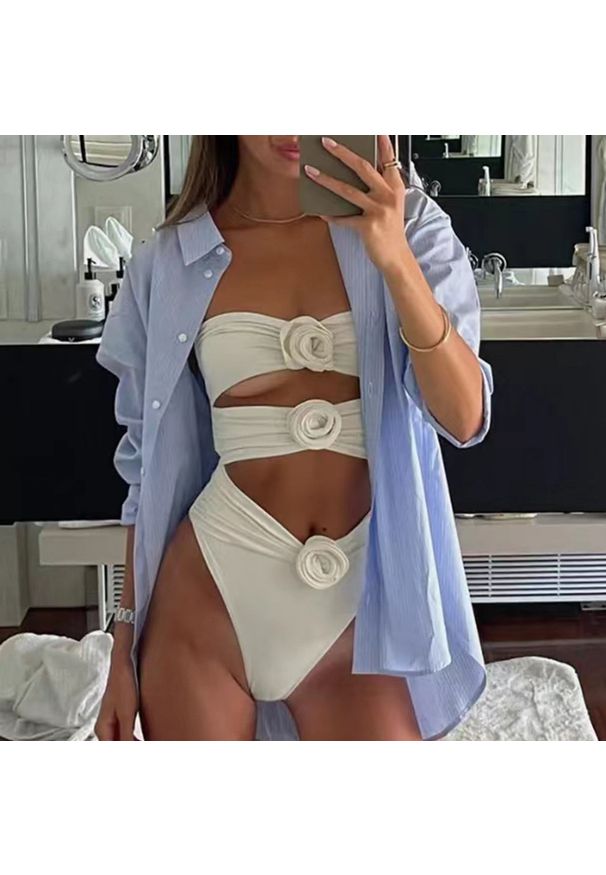 Intica - Jednoczęściowy kostium kąpielowy z florystycznym wzorem na lato Charlot. Kolor: beżowy. Materiał: materiał. Wzór: kwiaty