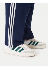 Adidas - adidas Spodnie dresowe adicolor Spacer Track KD4087 Granatowy Baggy Fit. Kolor: niebieski. Materiał: bawełna. Sport: turystyka piesza #9