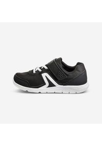 Decathlon - Buty sportowe dla dzieci Newfeel PW 100. Zapięcie: rzepy. Kolor: biały, wielokolorowy, czarny. Materiał: kauczuk. Szerokość cholewki: normalna