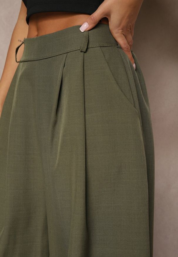 Renee - Ciemnozielone Eleganckie Spodnie Palazzo z Szerokimi Nogawkami Adivisa. Stan: podwyższony. Kolor: zielony. Styl: elegancki