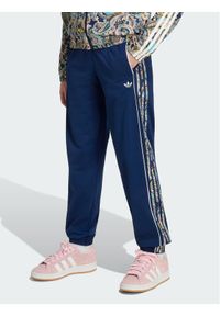 Adidas - adidas Spodnie dresowe Sst KR9187 Granatowy Loose Fit. Kolor: niebieski. Materiał: syntetyk #1