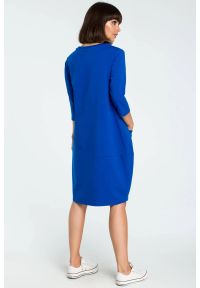 Sukienki.shop - Sukienka dresowa bombka oversize z kieszonką niebieska. Okazja: na co dzień. Kolor: niebieski, szary. Materiał: dresówka. Typ sukienki: oversize, bombki. Styl: casual #2