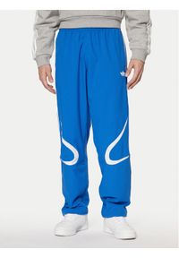 Adidas - adidas Spodnie dresowe adicolor Teamgeist JP1120 Niebieski Regular Fit. Kolor: niebieski. Materiał: syntetyk #1