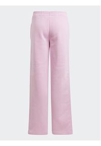 Adidas - adidas Spodnie dresowe Fleece Kids IJ5953 Różowy Loose Fit. Kolor: różowy. Materiał: bawełna