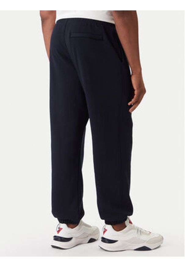 Guess Jeans Spodnie dresowe M6RB70 KCPR1 Granatowy Regular Fit. Kolor: niebieski. Materiał: bawełna