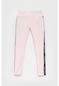 Guess legginsy dziecięce kolor różowy z nadrukiem. Kolor: różowy. Wzór: nadruk