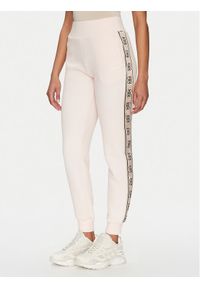 Guess Spodnie dresowe V2YB15 KB3P2 Różowy Regular Fit. Kolor: różowy. Materiał: syntetyk, bawełna