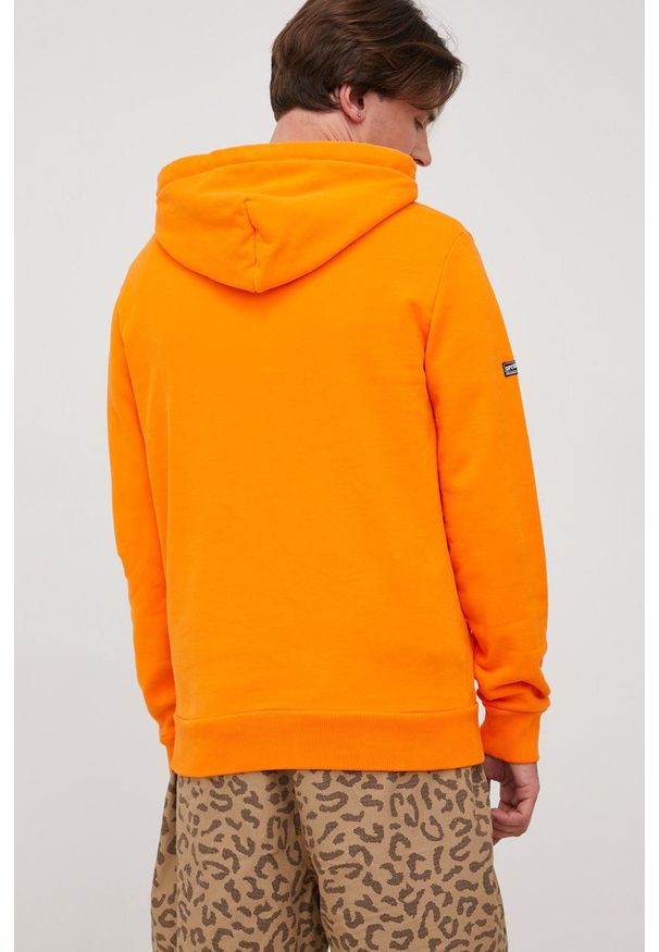 Superdry bluza bawełniana męska kolor pomarańczowy z kapturem z nadrukiem. Typ kołnierza: kaptur. Kolor: pomarańczowy. Materiał: bawełna. Wzór: nadruk