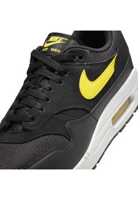 Nike Air Max 1 "Batman" Sneakersy męskie. Okazja: na co dzień. Kolor: czarny. Materiał: materiał, zamsz, skóra. Szerokość cholewki: normalna. Wzór: motyw z bajki. Model: Nike Air Max