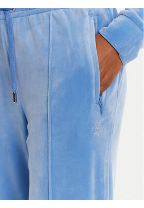 Juicy Couture Spodnie dresowe Tina JCAPW045 Niebieski Regular Fit. Kolor: niebieski. Materiał: syntetyk