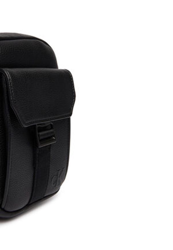 Calvin Klein Saszetka Webbing Strap Slim Reporter LV04D3281G Czarny. Kolor: czarny. Materiał: skóra
