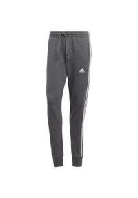 Adidas - Spodnie męskie adidas Essentials French Terry Tapered Cuff 3-Stripes. Kolor: biały, szary, wielokolorowy. Sport: fitness