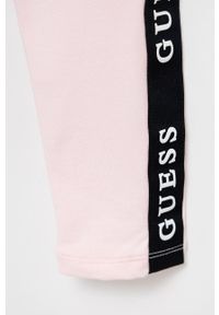 Guess legginsy dziecięce kolor różowy z nadrukiem. Kolor: różowy. Wzór: nadruk #3