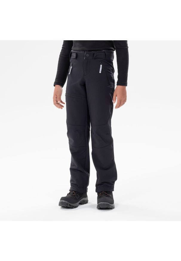 quechua - Spodnie softshell turystyczne dla dzieci Quechua MH500. Kolor: czarny. Materiał: elastan, poliester, materiał. Sezon: zima, lato. Sport: turystyka piesza