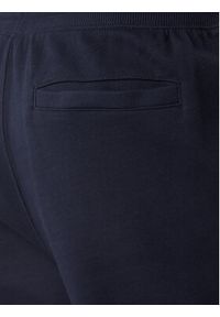 TOMMY HILFIGER - Tommy Hilfiger Spodnie dresowe Essential MW0MW37236 Granatowy Regular Fit. Kolor: niebieski. Materiał: bawełna #5