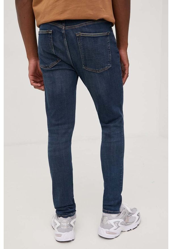 Superdry jeansy męskie. Kolor: niebieski