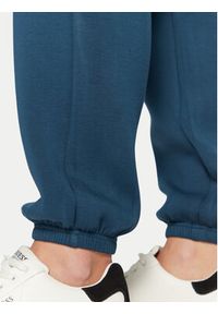 Guess Spodnie dresowe V4BB13 K7UW2 Niebieski Regular Fit. Kolor: niebieski. Materiał: wiskoza #4