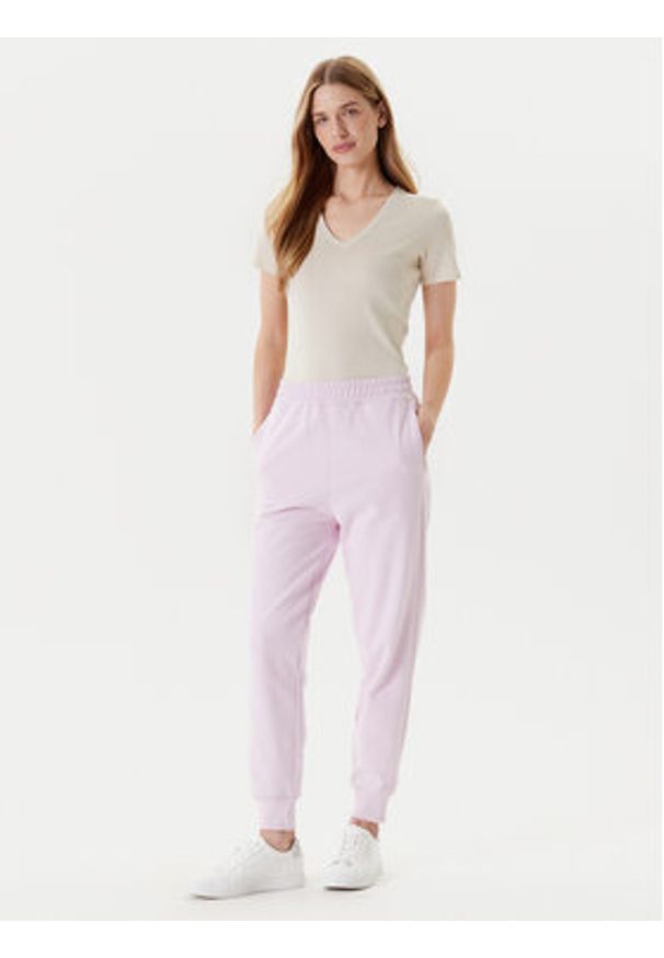 United Colors of Benetton - United Colors Of Benetton Spodnie dresowe 3UNIDF01A Różowy Regular Fit. Kolor: różowy. Materiał: bawełna