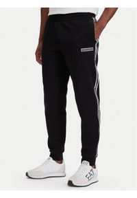 EA7 Emporio Armani Spodnie dresowe 7M002198 AF10377 UC001 Czarny Slim Fit. Kolor: czarny. Materiał: bawełna #1