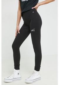 Tommy Jeans legginsy damskie kolor czarny z aplikacją. Kolor: czarny. Materiał: poliester, dzianina. Wzór: aplikacja