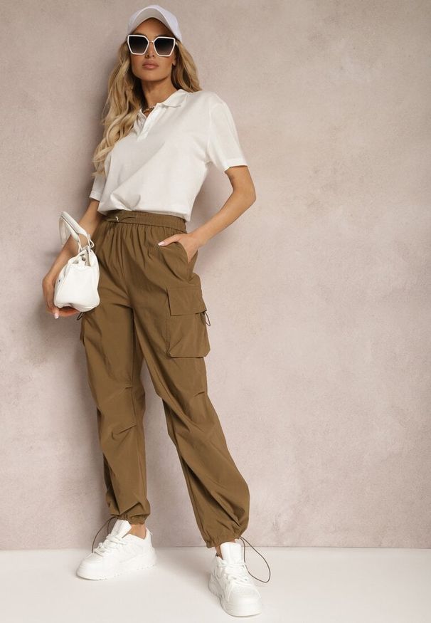 Renee - Brązowe Bojówki Spodnie ze Ściągaczami i Gumką w Talii z Kieszeniami po Bokach Laverina. Kolor: brązowy. Materiał: materiał. Styl: sportowy