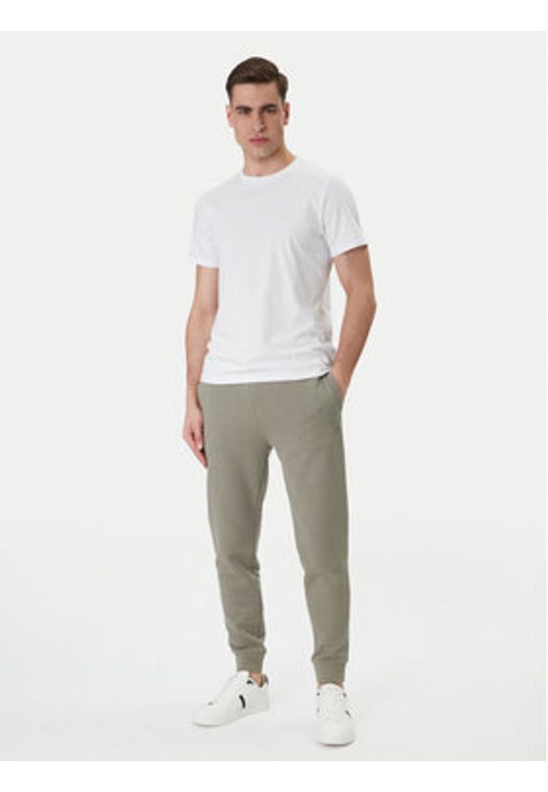 Guess Spodnie dresowe Z2YB22 KAIJ1 Zielony Regular Fit. Kolor: zielony. Materiał: bawełna