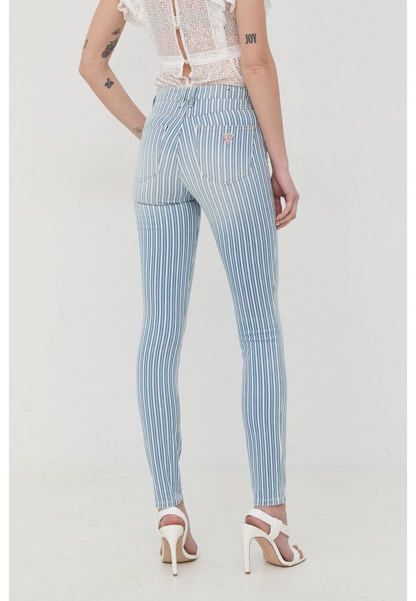 Guess spodnie damskie dopasowane medium waist. Kolor: niebieski. Materiał: tkanina