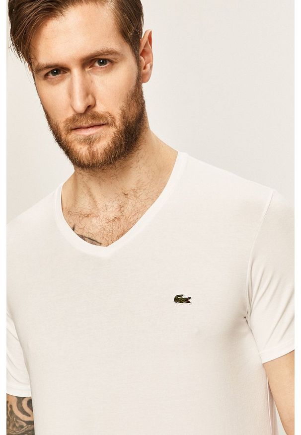 Lacoste - T-shirt. Okazja: na co dzień. Kolor: biały. Materiał: dzianina. Styl: casual