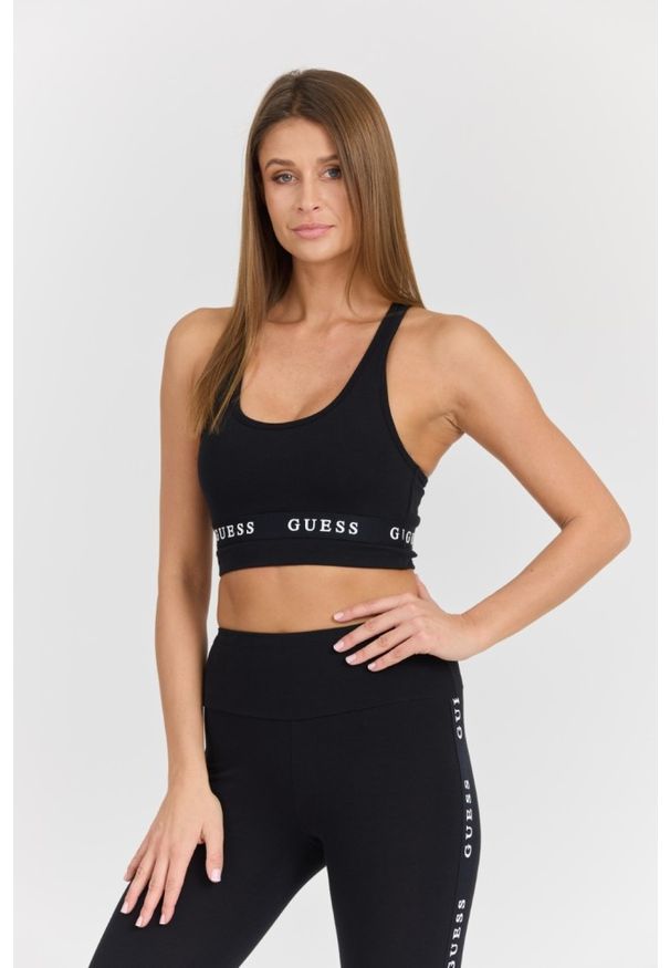 Guess - GUESS Damski czarny top Aline Eco Stretch Jersey. Okazja: na co dzień. Kolor: czarny. Materiał: jersey. Styl: casual
