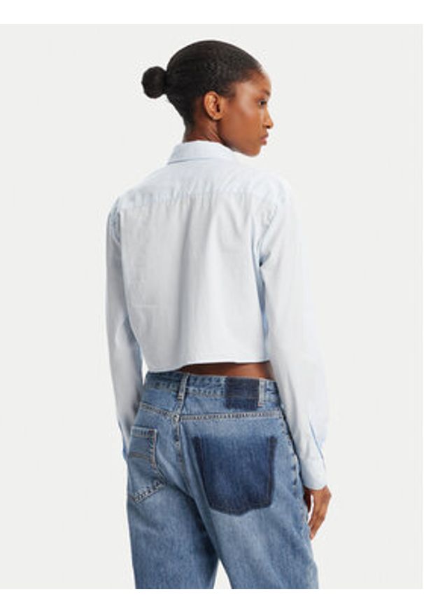 Tommy Jeans Koszula DW0DW21400 Błękitny Relaxed Fit. Kolor: niebieski. Materiał: bawełna