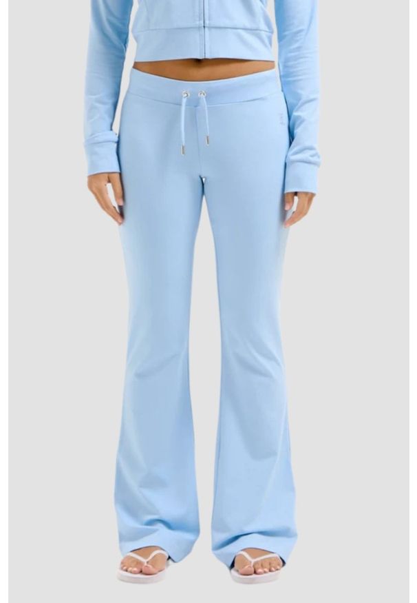 Juicy Couture - JUICY COUTURE Błękitne damskie spodnie dresowe Single Jersey Apollo Low Rise, Rozmiar S. Kolor: niebieski. Materiał: dresówka, jersey