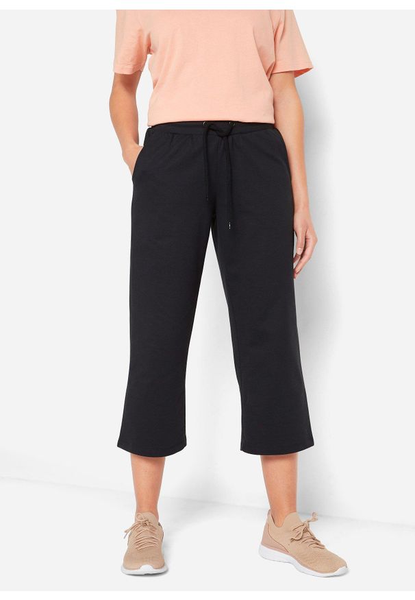 bonprix - Spodnie dresowe z bawełny organicznej, dł. do łydki. Kolor: czarny. Materiał: bawełna, dresówka