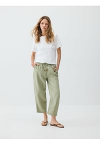 Reserved - Spodnie z wiskozą - jasnozielony. Kolor: zielony. Materiał: wiskoza