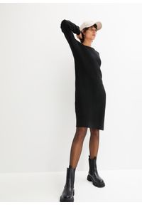 bonprix - Sukienka dzianinowa oversized w prążek, z rozcięciem. Kolor: czarny. Materiał: dzianina. Wzór: prążki #1