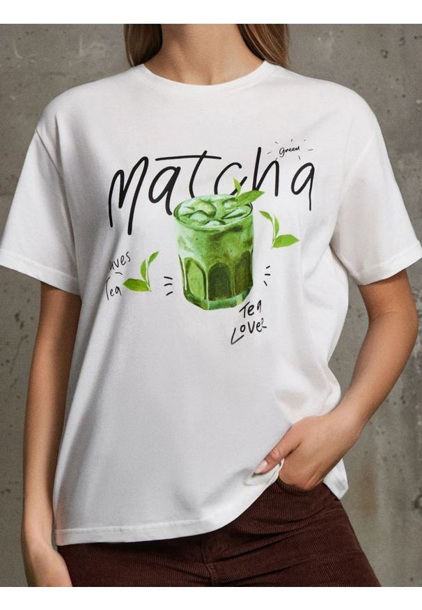 Sinsay - Bawełniana koszulka z kolorowym nadrukiem - kremowy. Kolor: kremowy. Materiał: bawełna. Wzór: nadruk, kolorowy